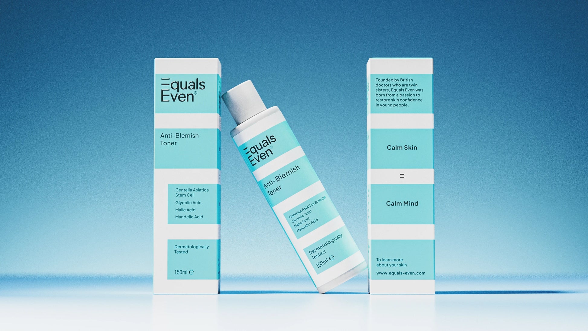 Three boxes and a bottle of Anti Blemish Toner stand on a blue surface with a gradient background. The white packaging with light blue accents highlights the liquid exfoliation that unclogs pores for glowing skin.