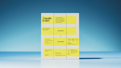 A white and yellow box of Spot Control Face Wash is shown against a blue background, highlighting its gentle cleanser formula that soothes skin and mind while cleansing impurities for a refreshed appearance.
