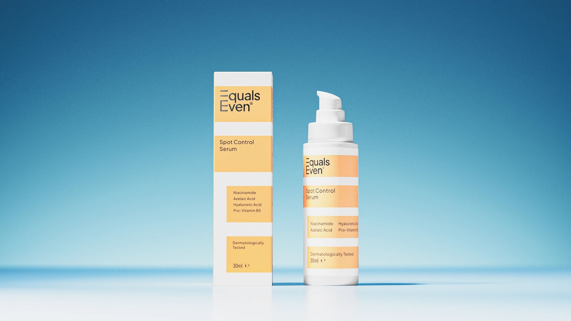 A bottle and box of Spot Control Serum, a potent blemish treatment in yellow and white packaging, are shown against a blue background. The label emphasizes breakout-fighting ingredients to help reduce post-blemish marks.
